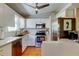 Bright kitchen with stainless steel appliances and white cabinets at 510 Pine S Ave, Oldsmar, FL 34677