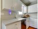 Bright kitchen with stainless steel appliances and white cabinets at 510 Pine S Ave, Oldsmar, FL 34677