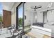 Beautiful main bedroom with a private balcony offering outdoor seating and natural light at 101 W Warren Ave # 2, Tampa, FL 33602