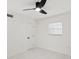 Bright bedroom with a modern ceiling fan, marble floors, and window at 1012 Cronley Pl, Sarasota, FL 34237