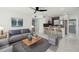 Open-concept living room flowing into kitchen, with modern decor at 1012 Cronley Pl, Sarasota, FL 34237