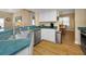 View of the kitchen featuring countertops, stainless steel appliances, and an eat-in dining area at 1028 Rosetree Ln, Tarpon Springs, FL 34689