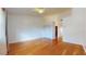 Spacious bedroom with hardwood floors and a ceiling fan at 10488 Saint Tropez Pl, Tampa, FL 33615