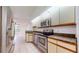 Open kitchen with stainless steel appliances and breakfast nook at 10488 Saint Tropez Pl, Tampa, FL 33615
