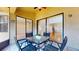 Outdoor patio features room for seating and a peaceful view through sliding glass doors at 10488 Saint Tropez Pl, Tampa, FL 33615