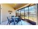 Outdoor patio features room for seating and a peaceful view of the back yard at 10488 Saint Tropez Pl, Tampa, FL 33615