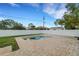 Backyard features an in-ground pool, patio, and fenced yard, perfect for outdoor enjoyment at 1054 W Baffin Dr, Venice, FL 34293