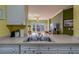 Bright kitchen with stainless steel sink overlooking the living area, creating an open and inviting space at 1216 S Missouri Ave # 225, Clearwater, FL 33756