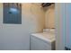 Laundry room with washing machine and wire shelving for convenient storage and organization at 1216 S Missouri Ave # 225, Clearwater, FL 33756