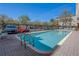 Refreshing pool with shallow end markers, providing a secure and enjoyable swimming experience for all residents at 1216 S Missouri Ave # 225, Clearwater, FL 33756