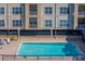 Enjoy a refreshing swim in this inviting pool, set against a backdrop of a well-maintained apartment complex at 1216 S Missouri Ave # 225, Clearwater, FL 33756