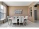 Dining room with neutral tones, tile floors, and seating for six at 1453 Appleton Pl, Wesley Chapel, FL 33543