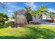 Charming single-story home with well-manicured lawn and beautiful landscaping at 1453 Appleton Pl, Wesley Chapel, FL 33543