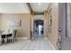 Inviting hallway with neutral paint and tile floors, leading to the living areas at 1453 Appleton Pl, Wesley Chapel, FL 33543