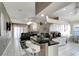 Open concept kitchen featuring modern appliances and connecting to the living room area at 1453 Appleton Pl, Wesley Chapel, FL 33543