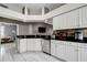 Well-equipped kitchen with granite counters, white cabinets, and stainless steel appliances at 1453 Appleton Pl, Wesley Chapel, FL 33543