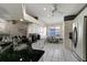 Spacious kitchen with stainless steel appliances, granite countertops, and adjacent dining area at 1453 Appleton Pl, Wesley Chapel, FL 33543