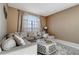 Comfortable living room with large sectional, area rug and decorative coffee table at 1453 Appleton Pl, Wesley Chapel, FL 33543