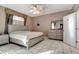 Comfortable main bedroom with ceiling fan and light neutral paint at 1453 Appleton Pl, Wesley Chapel, FL 33543