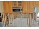 Framing of a kitchen showcasing studs and the beginning stages of a renovation at 16217 Redington Dr, Redington Beach, FL 33708