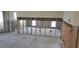 Renovation of a living room showcasing stud walls and electrical wiring at 16217 Redington Dr, Redington Beach, FL 33708