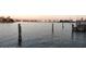 Peaceful waterfront with multiple posts and dock at 16217 Redington Dr, Redington Beach, FL 33708