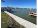 Waterfront property features boat dock with access to beautiful waters and neighborhood views at 16217 Redington Dr, Redington Beach, FL 33708