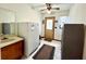 Practical kitchen featuring a large refrigerator and lots of open floor space at 1811 Tawnee Pl, Brandon, FL 33510