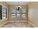 Bright dining room with plantation shutters and view of the pool at 2307 7Th Sw St, Ruskin, FL 33570