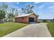 View of the additional garage and driveway at 2307 7Th Sw St, Ruskin, FL 33570