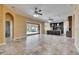 Expansive living room with tile floors, access to the pool, and open view to the kitchen at 2307 7Th Sw St, Ruskin, FL 33570