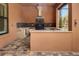 This outdoor kitchen is complete with a built-in grill, bar, sink, and stainless steel refrigerator at 2307 7Th Sw St, Ruskin, FL 33570