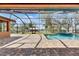 Beautiful screened in pool with brick pavers and view of the river at 2307 7Th Sw St, Ruskin, FL 33570