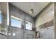 The shower stall features stone walls and mosaic tile accents, with overhead shower head at 2307 7Th Sw St, Ruskin, FL 33570