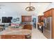 Stylish kitchen with stone countertops, stainless steel appliances, and custom cabinets at 2709 Fairway View Dr, Valrico, FL 33596