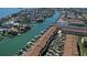 Waterfront community featuring boat docks and lush landscaping at 325 Madeira Cir, Tierra Verde, FL 33715