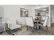 Bright dining area with a round table, stylish chairs, and modern decor for comfortable dining at 325 Madeira Cir, Tierra Verde, FL 33715