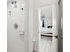 Tiled walk-in shower visible from the open ensuite bedroom at 325 Madeira Cir, Tierra Verde, FL 33715