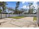 Backyard featuring a gazebo, privacy fences, sparse grass, and a brick-paved pathway at 350 51St N Ave, St Petersburg, FL 33703