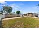 This landscaped backyard features a fenced yard, gazebo, and patio area at 350 51St N Ave, St Petersburg, FL 33703