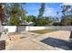 An expansive backyard features a gazebo, brick paver walkway, and a privacy fence at 350 51St N Ave, St Petersburg, FL 33703