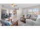 This open concept living room offers tile floors and plenty of natural light at 350 51St N Ave, St Petersburg, FL 33703