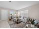 This open concept living room offers tile floors, neutral paint and plenty of natural light at 350 51St N Ave, St Petersburg, FL 33703