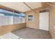 Covered patio featuring concrete floors, screen walls, and a view of the backyard at 350 51St N Ave, St Petersburg, FL 33703