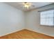 Bedroom featuring a ceiling fan and a window with blinds at 4200 Queen N St, St Petersburg, FL 33714