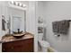 Bathroom featuring custom bowl sink, granite countertops, and ceramic tile flooring at 4239 Tyler N Cir, St Petersburg, FL 33709