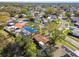 Aerial view of a home featuring a nearby neighborhood and mature shade trees at 6434 Sawyer Rd, Tampa, FL 33634