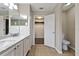 Bathroom boasts double sinks, and a closet and toilet room at 7842 Carriage Pointe Dr, Gibsonton, FL 33534