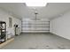Spacious two car garage with attached mechanics and an automatic door for easy access at 7842 Carriage Pointe Dr, Gibsonton, FL 33534