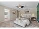 The primary bedroom suite is staged with decor and updated design accents at 7842 Carriage Pointe Dr, Gibsonton, FL 33534